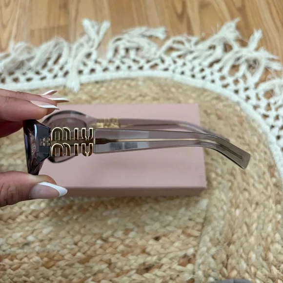 Miu Miu MU14ZS Violet Sunglasses